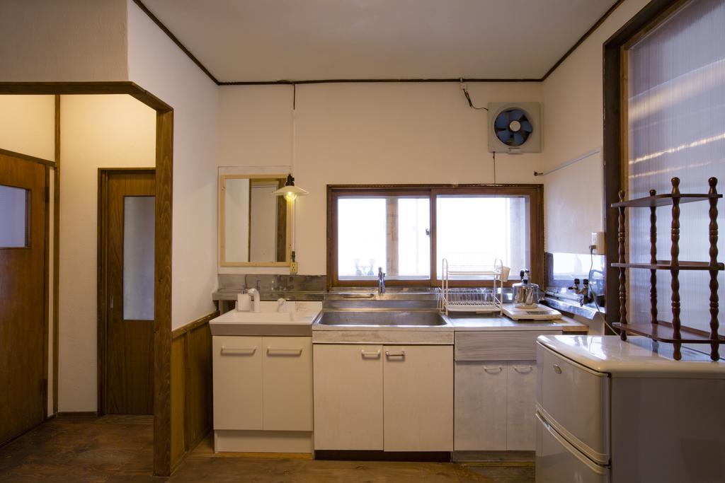 Guest House Sato Shoten Toyoura Exterior foto